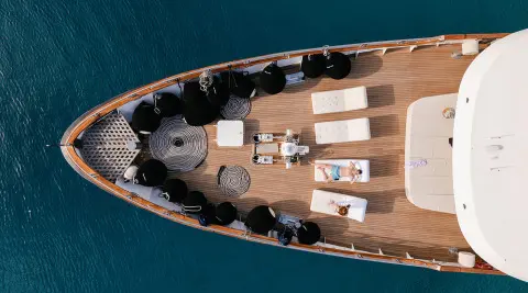 Top-down view of Cristal yacht bow deck with seating and sun loungers