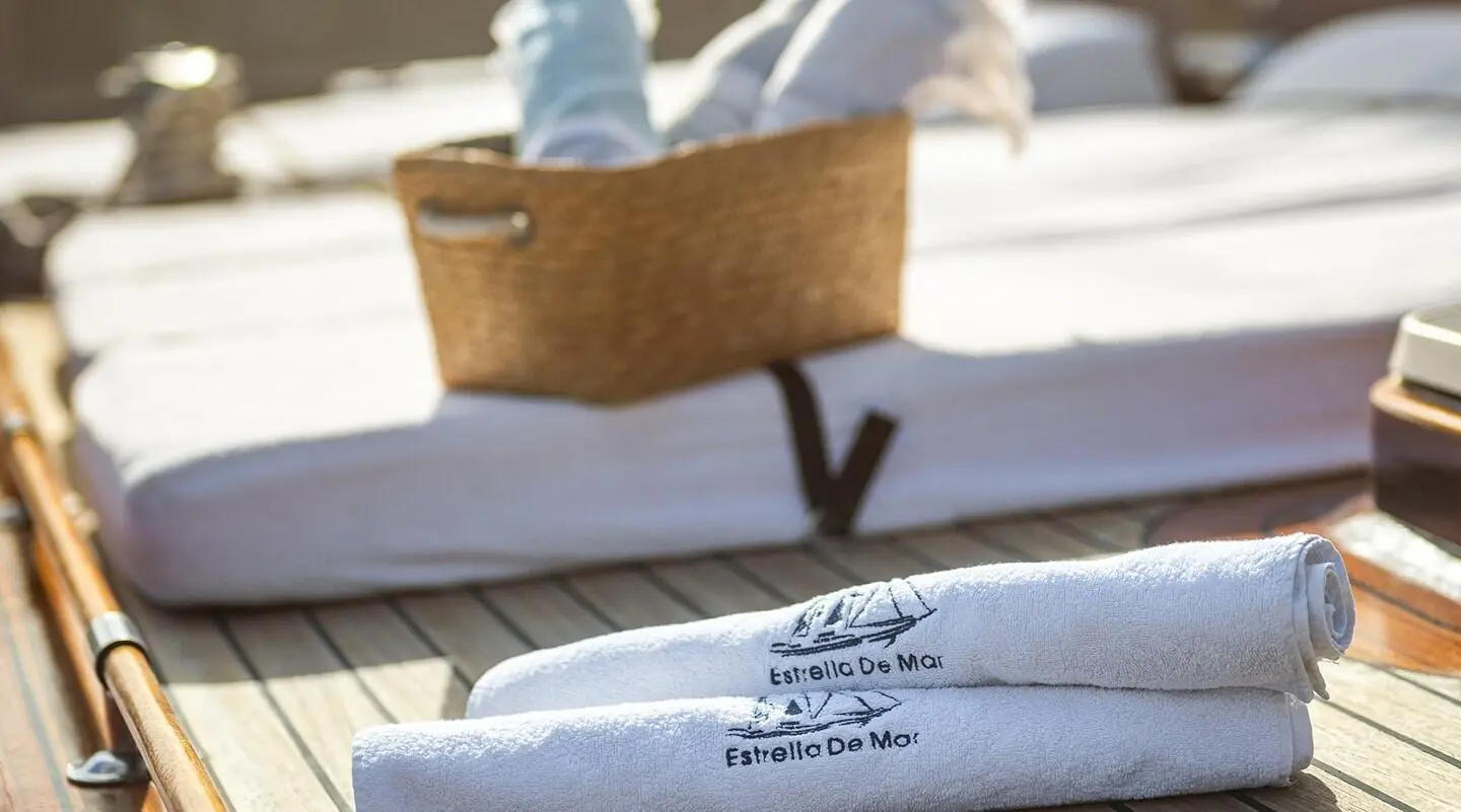 Yacht Estrella De Mar midship with towels on deck, gulet-style vessel