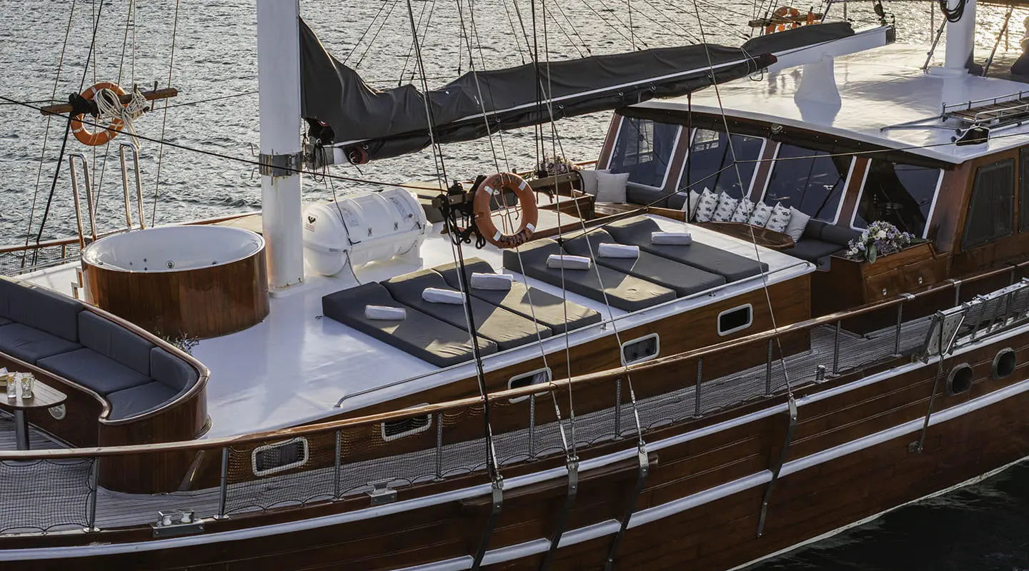Gulet yacht in Croatia on sun deck, wooden railings and ropes visible