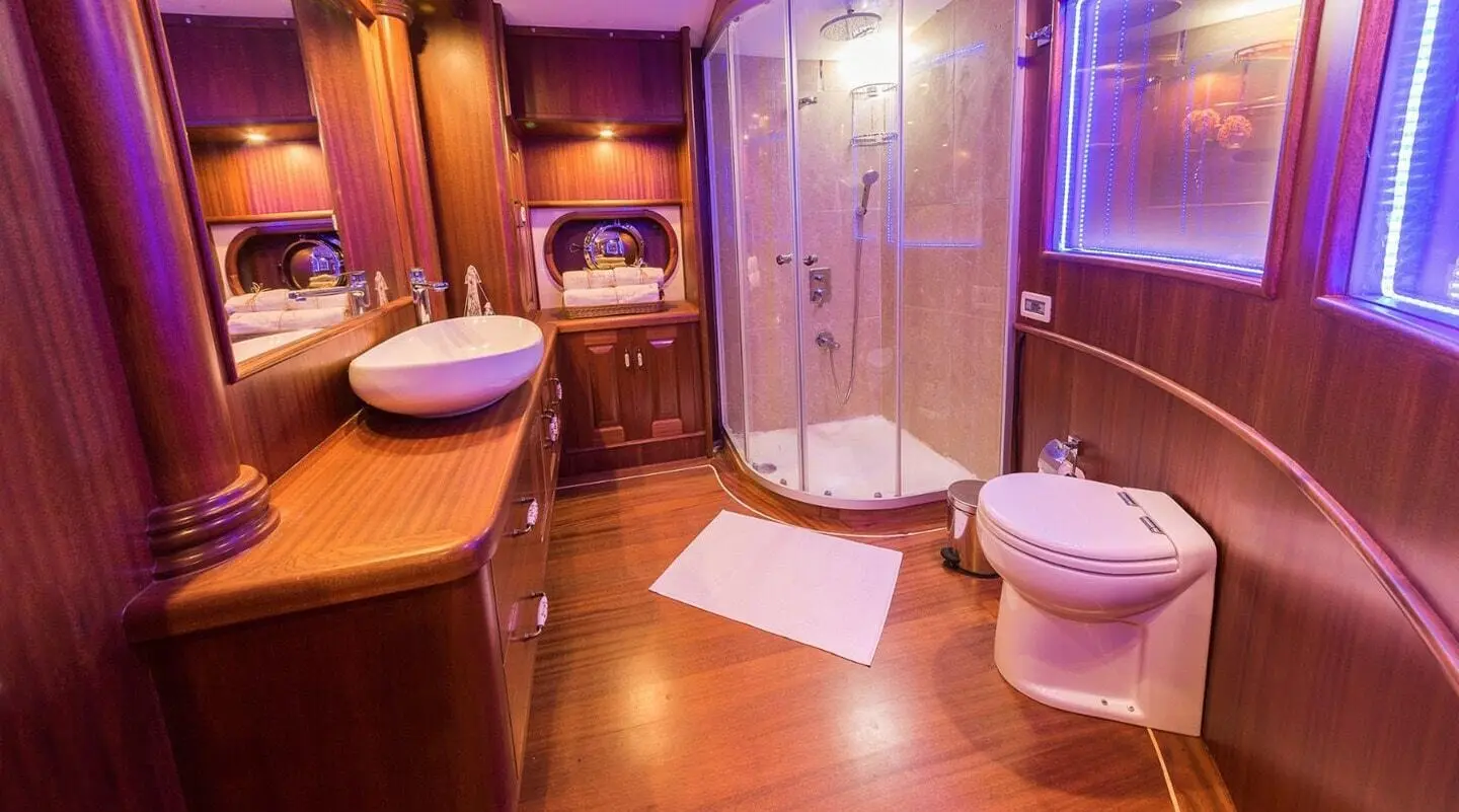 Halcon Del Mar luxury gulet at sunset with deck and seating aboard