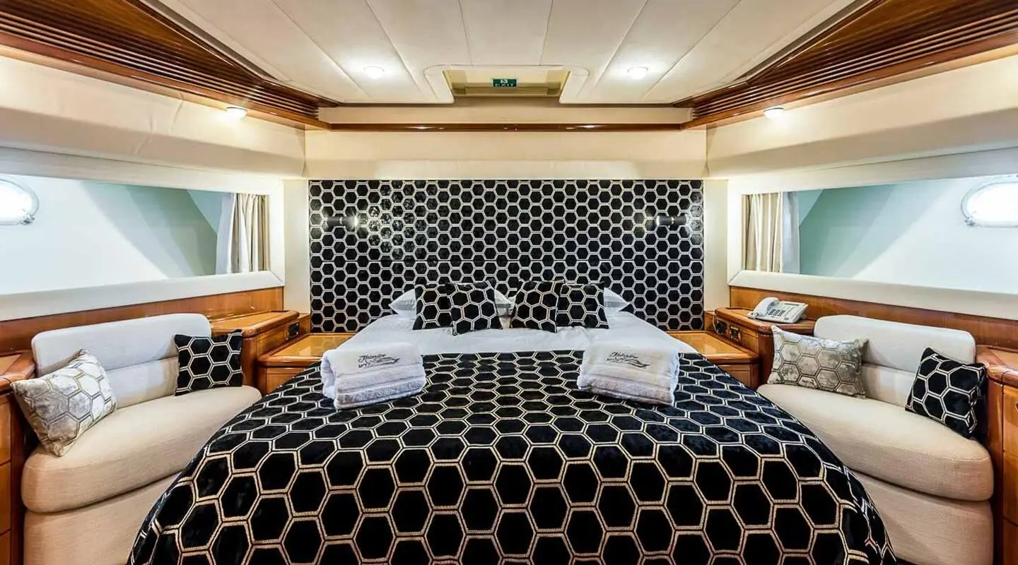 Interior of Miss Katariina yacht with patterned carpet and seating area