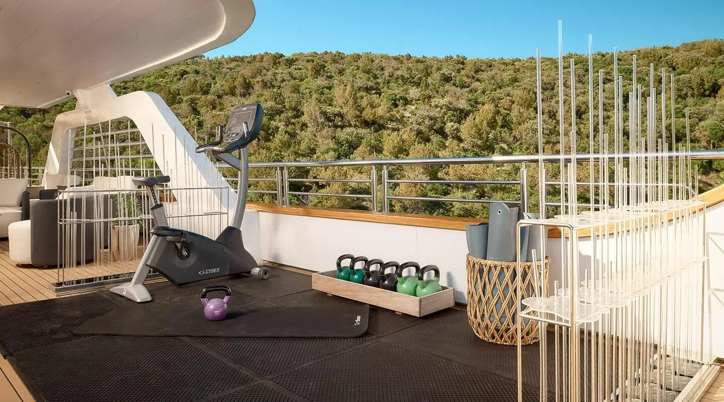 Outdoor deck with gym equipment and kettlebell rack