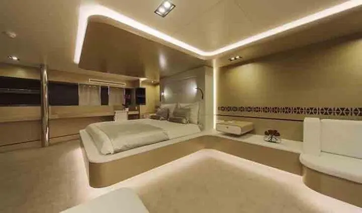 Master cabin with king bed, ensuite, neutral tones, soft lighting