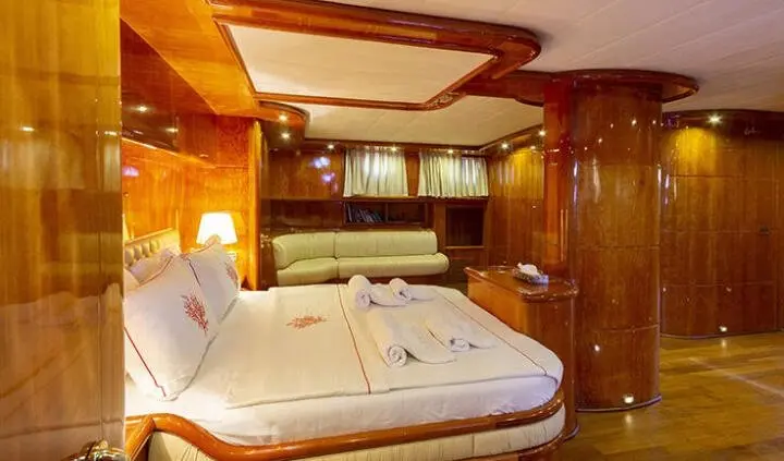 Silver Moon master cabin with king bed, ensuite visible in yacht interior