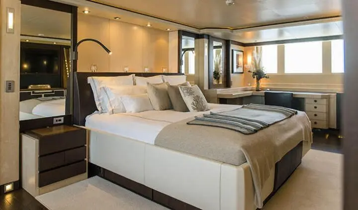 Alalya yacht master cabin with two twin beds pushed together, beige bedding