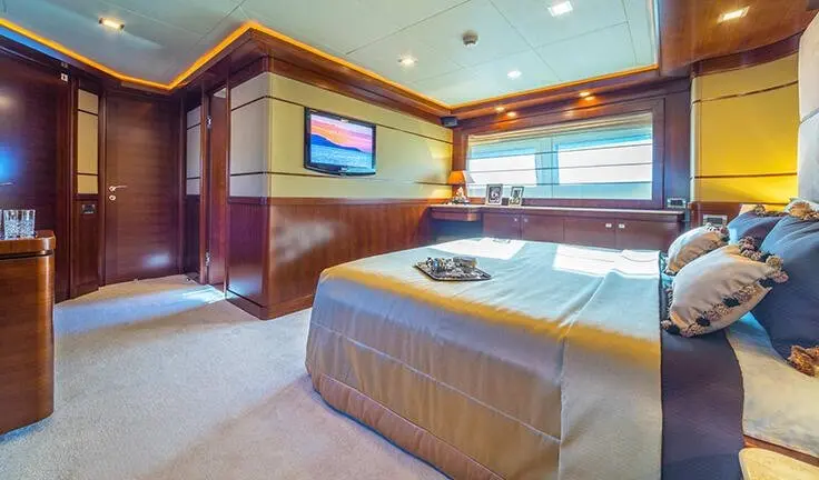 Master cabin on Seventh Sense yacht with king bed and ensuite bathroom