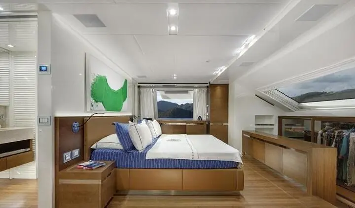 Morning Star yacht cabin with king bed, ensuite bathroom visible in the image