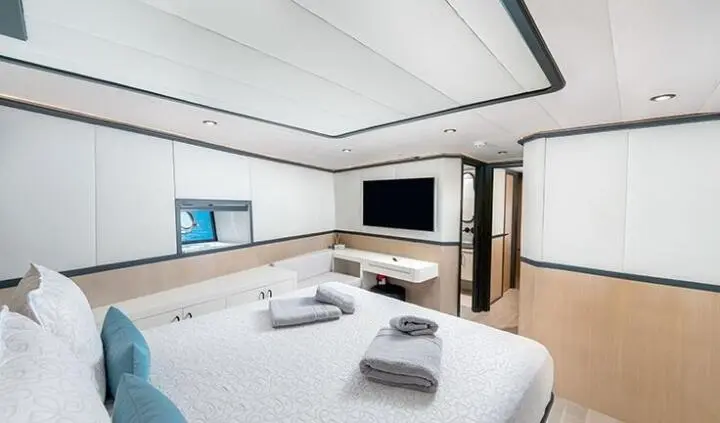Calm Down yacht cabin with king bed and en-suite bathroom view