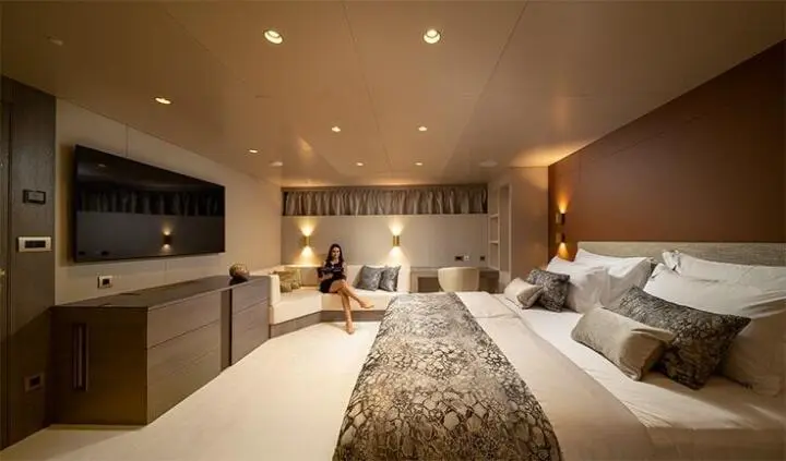 Nocturno master cabin with king bed, ensuite vibe and warm lighting