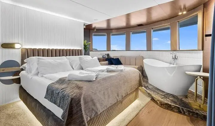 Bella yacht master cabin with king bed, ensuite, large windows, ocean view