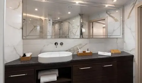 Love Story yacht master cabin with king bed, ensuite and wooden vanity
