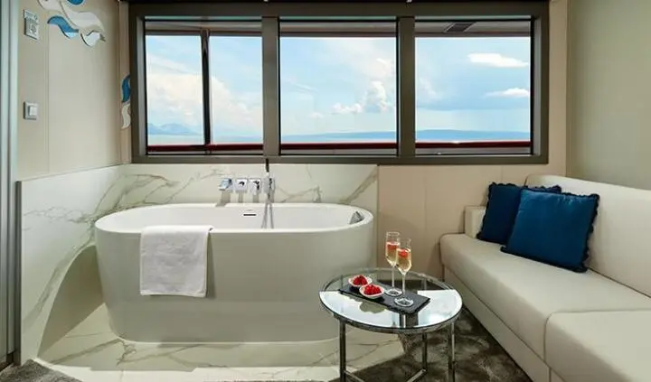 Ohana yacht master cabin with king bed, ensuite, large windows, seating area