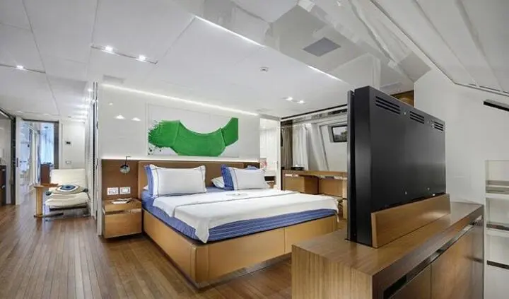 Morning Star yacht master cabin with king bed and ensuite visible