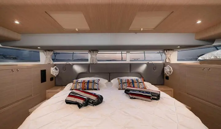 Master cabin with two single beds side by side and ensuite bathroom