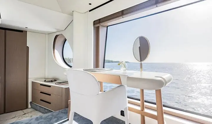 Viva II master cabin with king bed, ensuite visible through window seat area