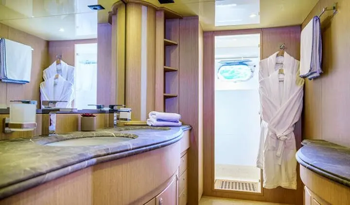 Phantom yacht master cabin with king bed and ensuite bathroom visible