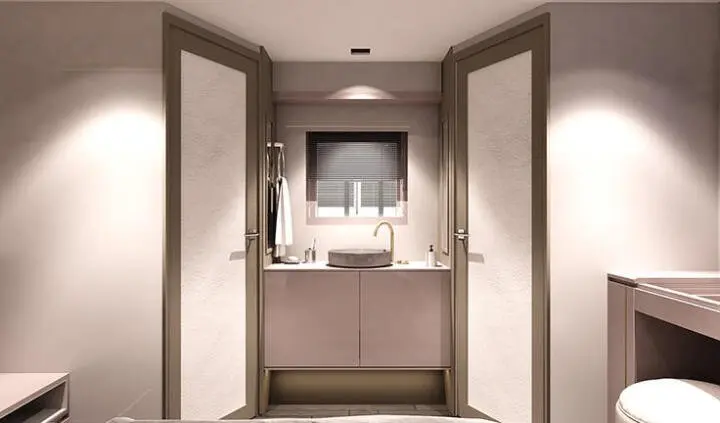 Master cabin with king bed, brown cabinetry, and ensuite visible.