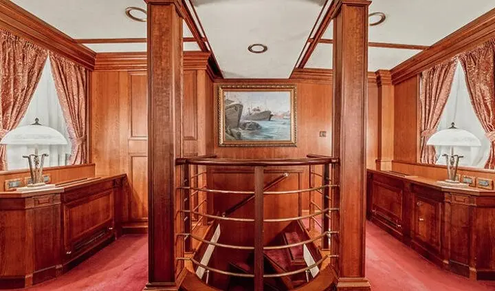 Seagull II master cabin with king bed and ensuite door visible