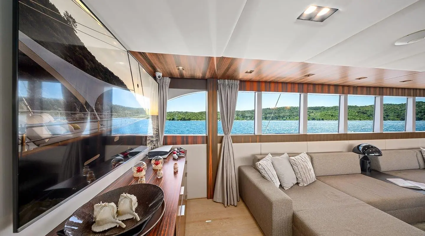 Dalmatino yacht interior lounge with large windows and ocean view