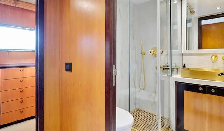 Mobius yacht cabin with a king bed and ensuite visible from doorway