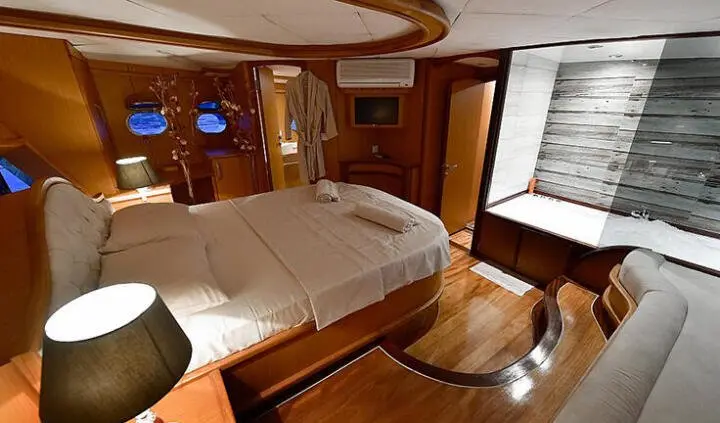 Blu Dream master cabin with king bed, ensuite door, wood panels