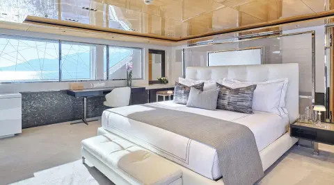 La Pellegrina 1 yacht interior with cream sofas and sunlit windows