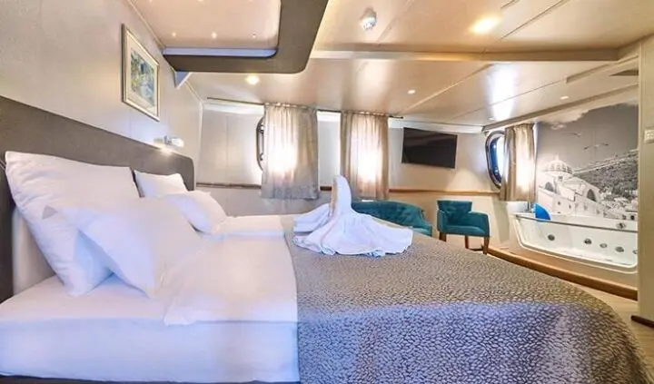 Casablanca yacht master cabin with king bed and en-suite visible