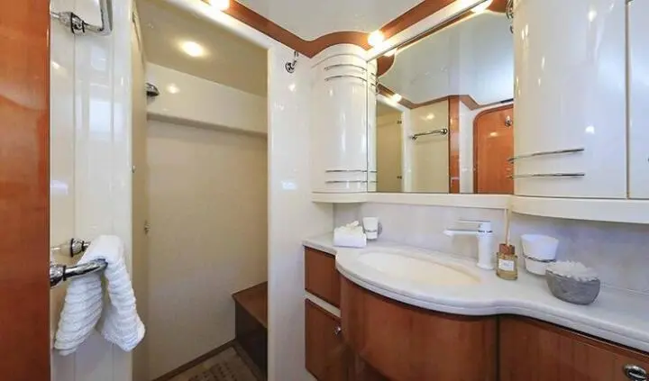 Quo Vadis I master cabin with king bed and ensuite visible in image