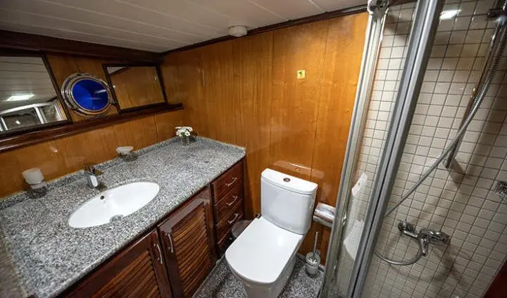 Yacht Kayhan 8 cabin with king bed and ensuite bath fixtures visible