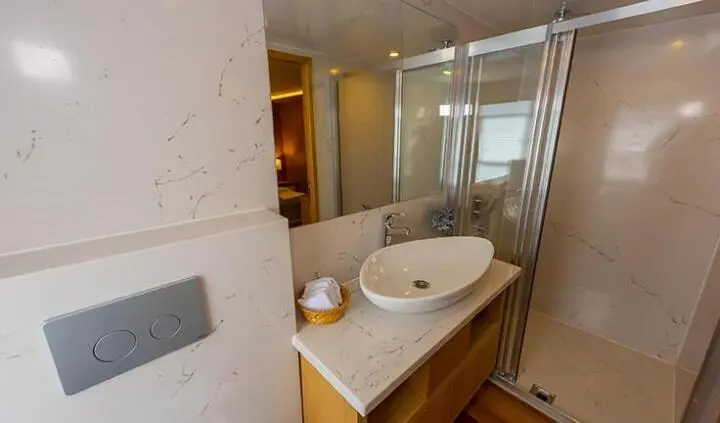 Master cabin ensuite bath on Simay M yacht with sink and mirror