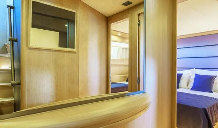 Phantom cabin bed with ensuite-like doorway and wood paneling