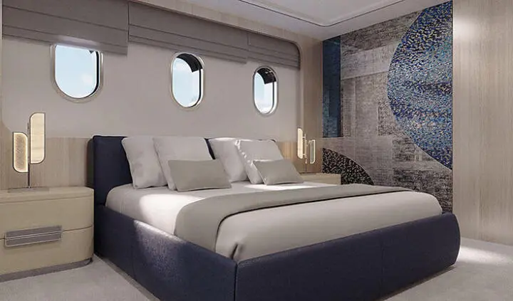 Maia yacht master cabin with king bed, side lamps, and ensuite door visible