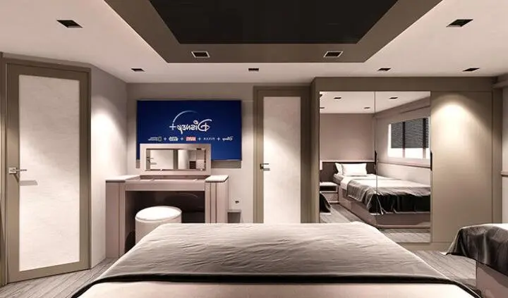 Master cabin with king bed, ensuite head, soft lighting and cabinetry