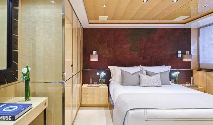 La Pellegrina 1 master cabin with king bed and ensuite bathroom visible
