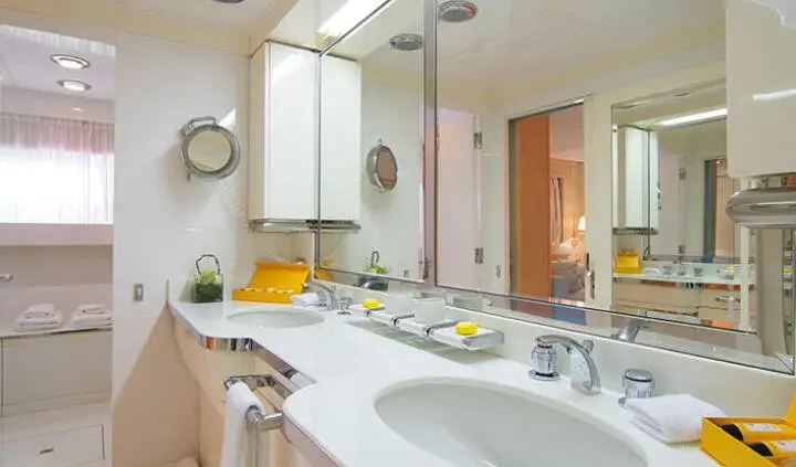 Master cabin with king bed, ensuite bathroom, bright vanity area