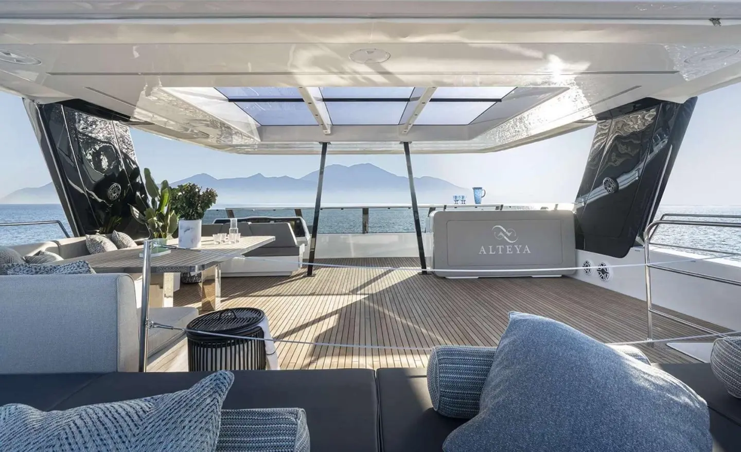 Alteya luxury yacht deck with outdoor seating, sun loungers, and panoramic sea view