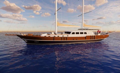 Tosca luxury sailing yacht on calm blue sea at sunset, classic wooden hull and twin masts