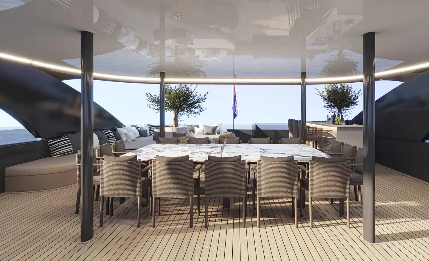 Bello luxury yacht outdoor deck with bar seating and expansive sunset view