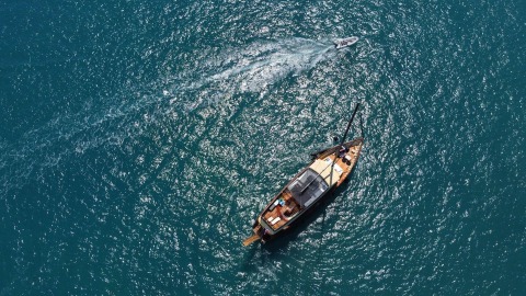 Aerial view of a luxury motor yacht with open deck on the sea
