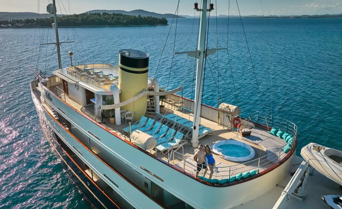 Casablanca yacht deck with sun lounge chairs and a blue sea backdrop