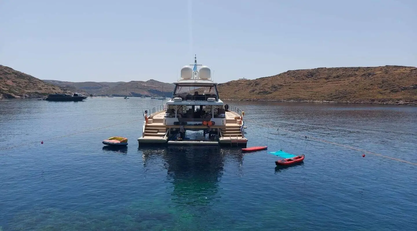 Just Marie 2 yacht anchored with water toys in calm bay, blue water