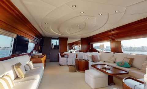 Lady Natassa yacht interior with luxurious seating and wood paneling