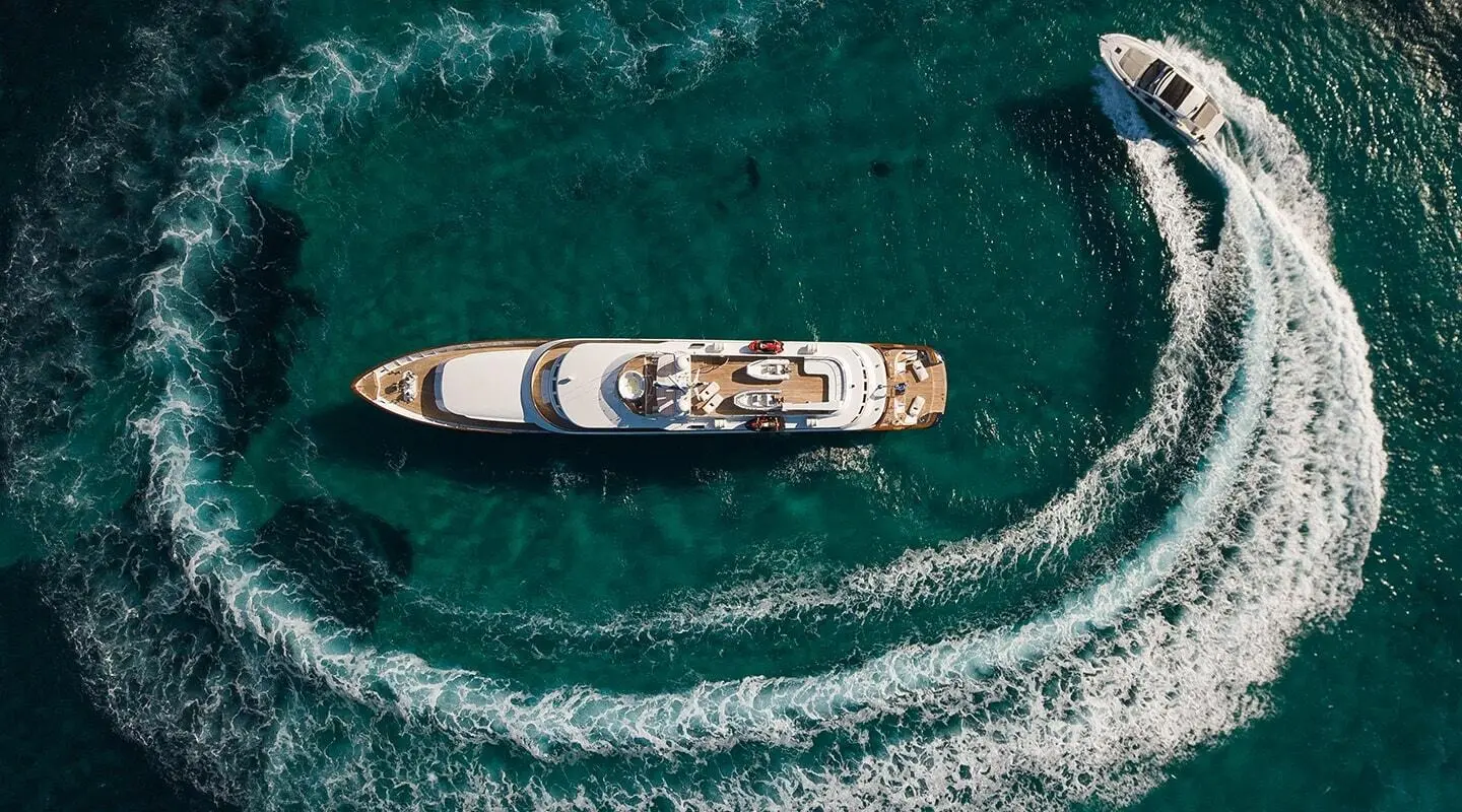 Wind Of Fortune yacht seen from above on clear water