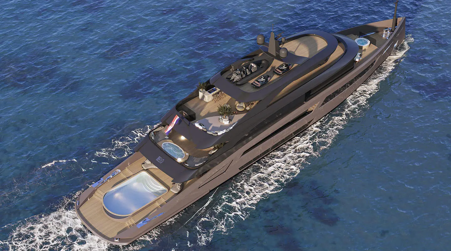 Aerial view of motor yacht Bello cruising on blue water
