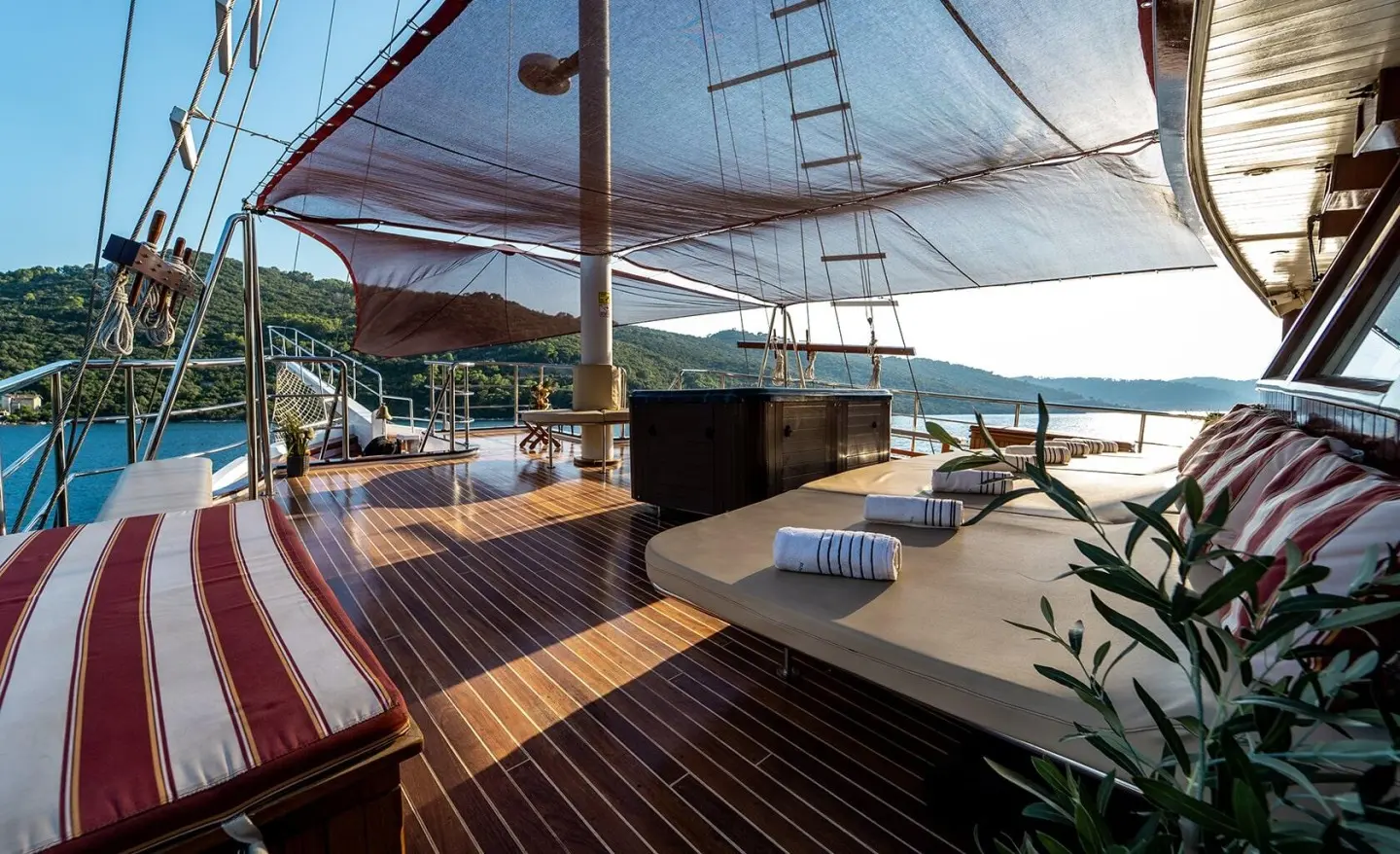 Cesarica gulet on the wooden bow deck with shade sail and rigging