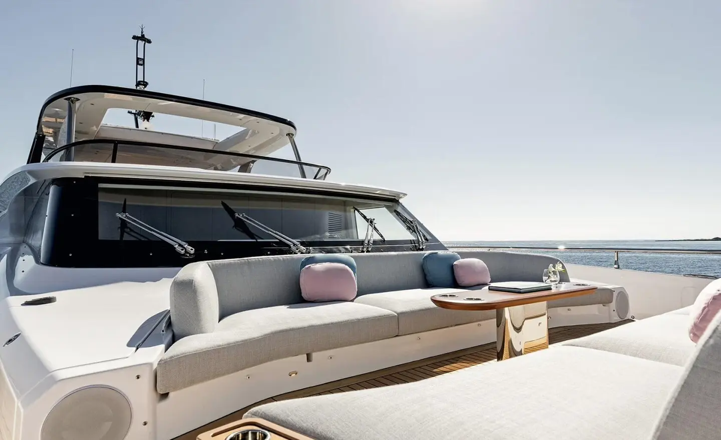 Viva II luxury yacht bow deck with seating area and rope railing