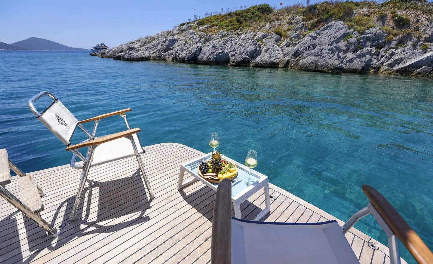 Deck view of Gazella gulet with a swim platform and blue sea