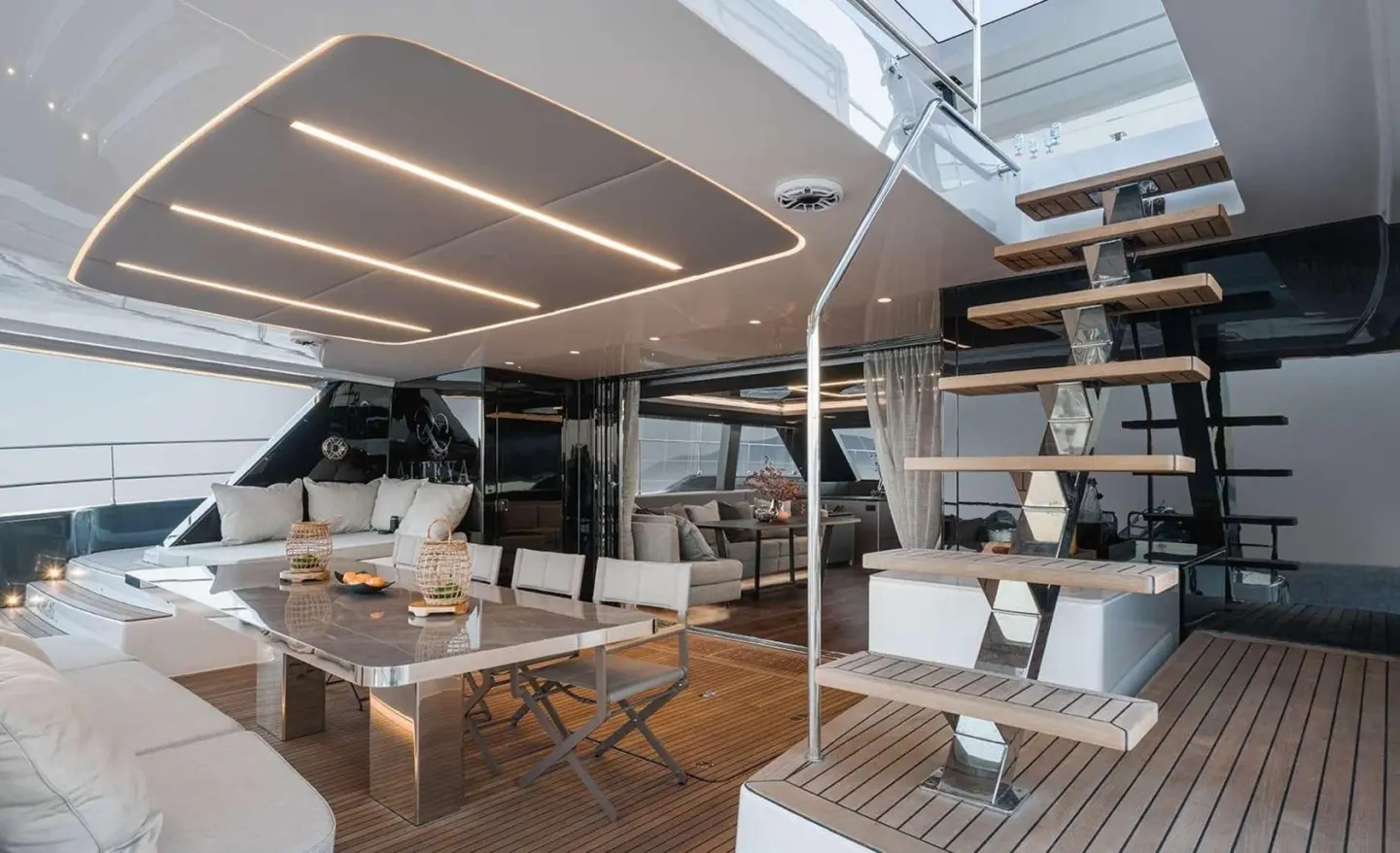 View of Alteya yacht deck with seating, stairs, and shaded area