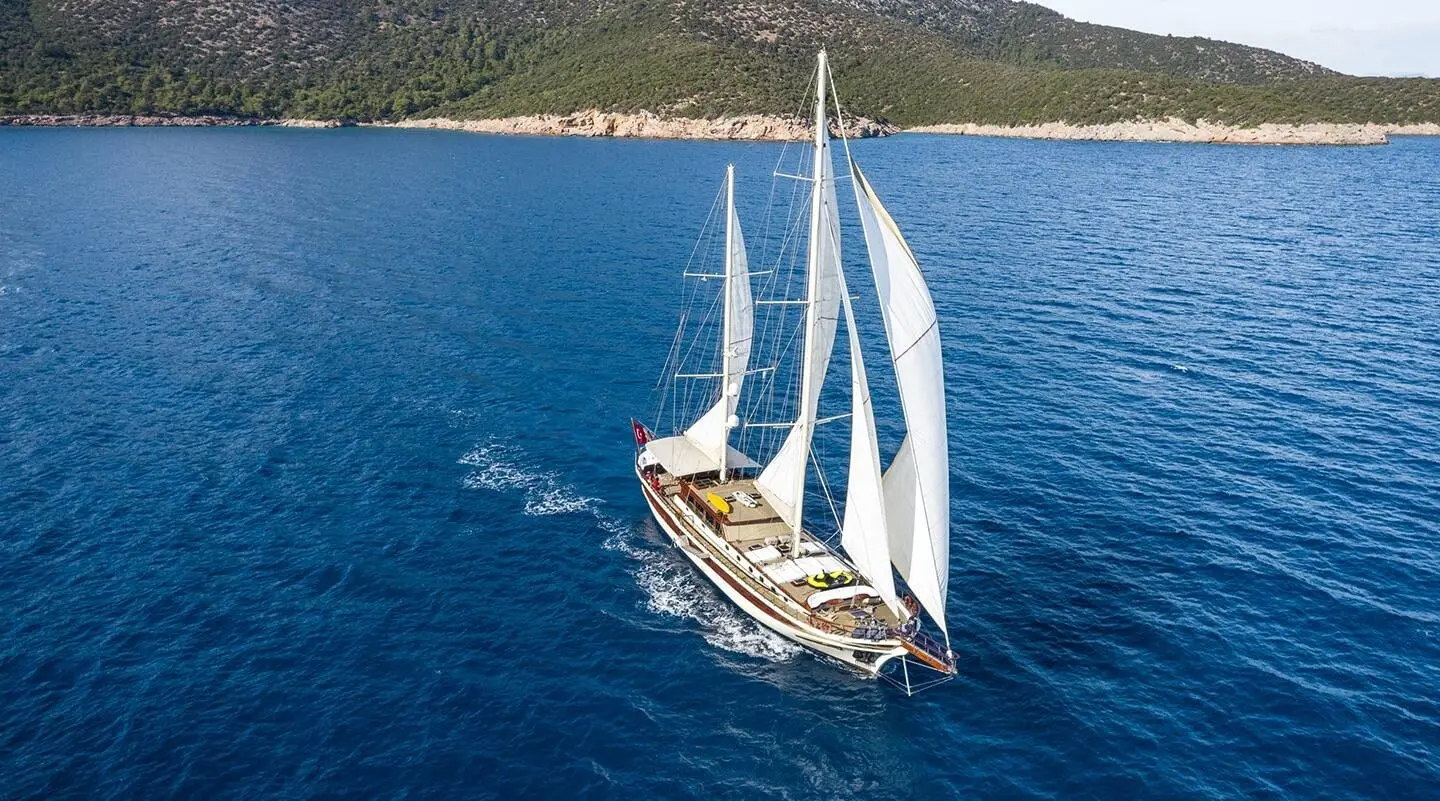 Two-masted sailing gulet on blue sea, Estrella De Mar view