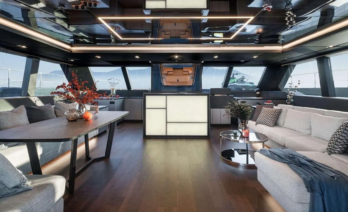 Luxurious salon aboard Alteya yacht with plush seating and wood floors